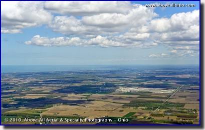 Aerial view of clouds popping up along Lake Erie's southern shore