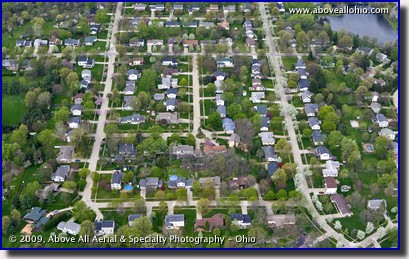 Aerial photo of spring flowering trees in a suburban midwestern neighborhood