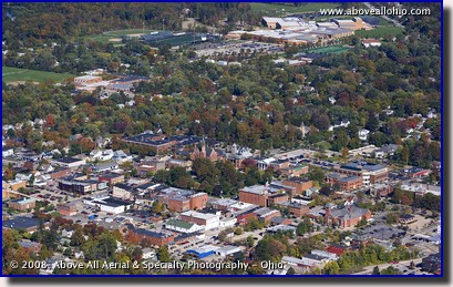 Aerial photograph of downtown Medina, Ohio, with Medina high School visible in the background.